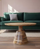 Green sofa with a wooden coffee table in a living room setting
