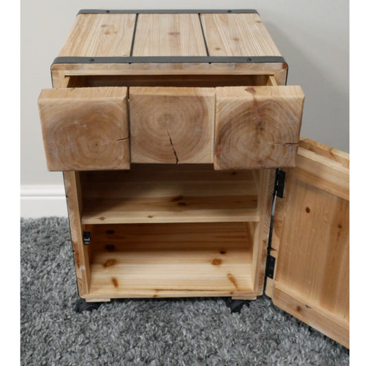 Wooden storage unit with a door open on a gray carpeted floor.