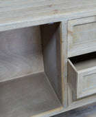 Wooden desk with open drawer and shelf