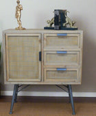 Wooden cabinet with rattan doors and drawers against a neutral wall.