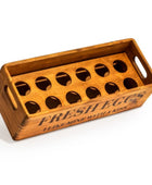 Wooden egg holder with 'Fresh Eggs' text on a white background