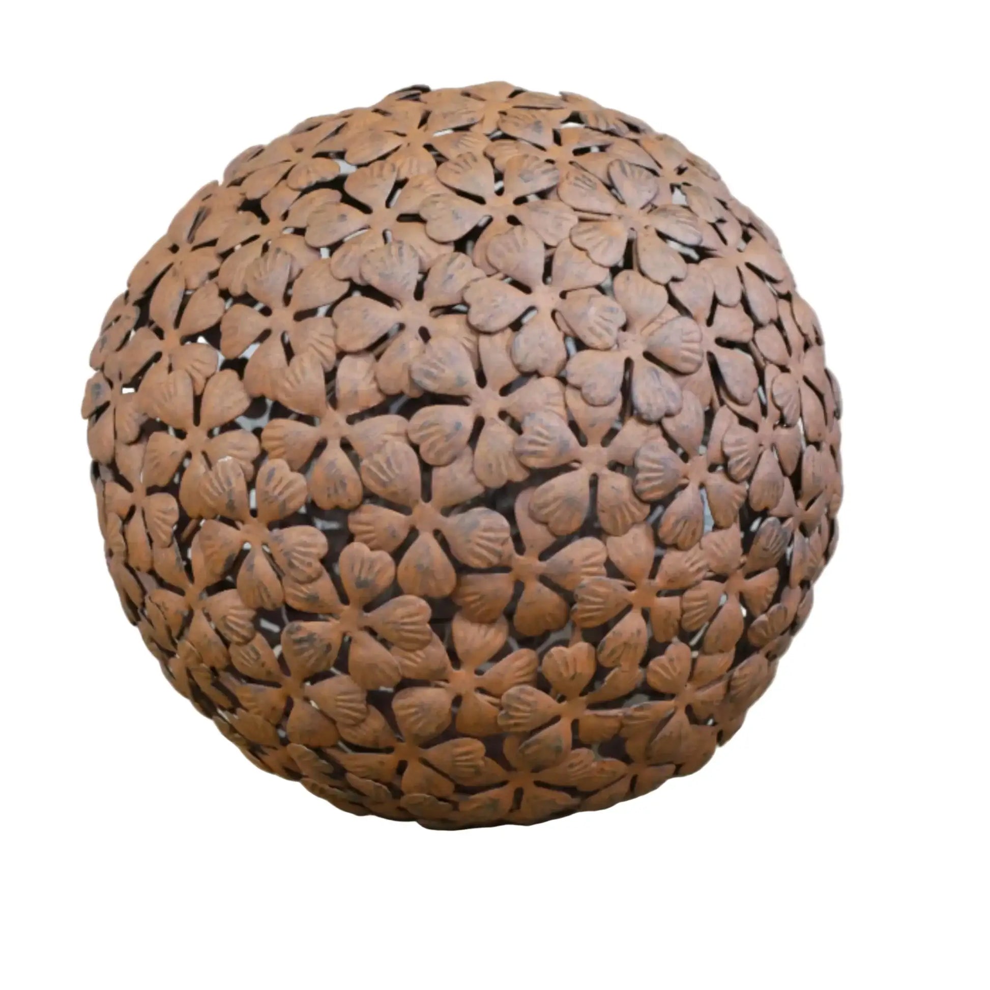 Decorative spherical object with a floral pattern on a wooden surface