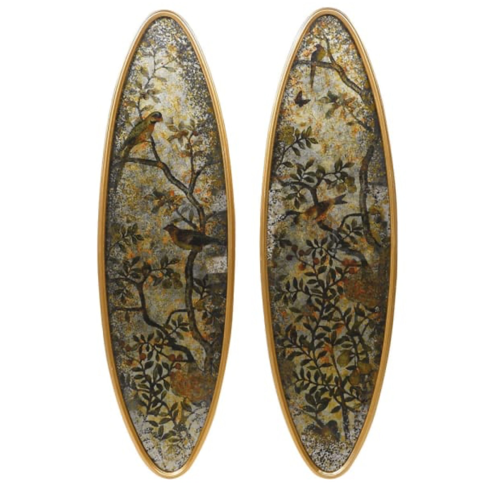 Oval-shaped earrings with nature-themed design on a white background