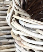 Close-up of a woven basket with natural wood texture