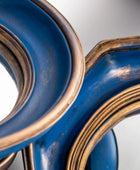 Close-up of a blue and gold decorative item on a white background