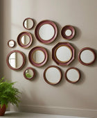Set of decorative plates with a maroon rim on a white background