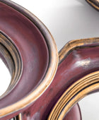 Close-up of a wooden object with a reflective surface