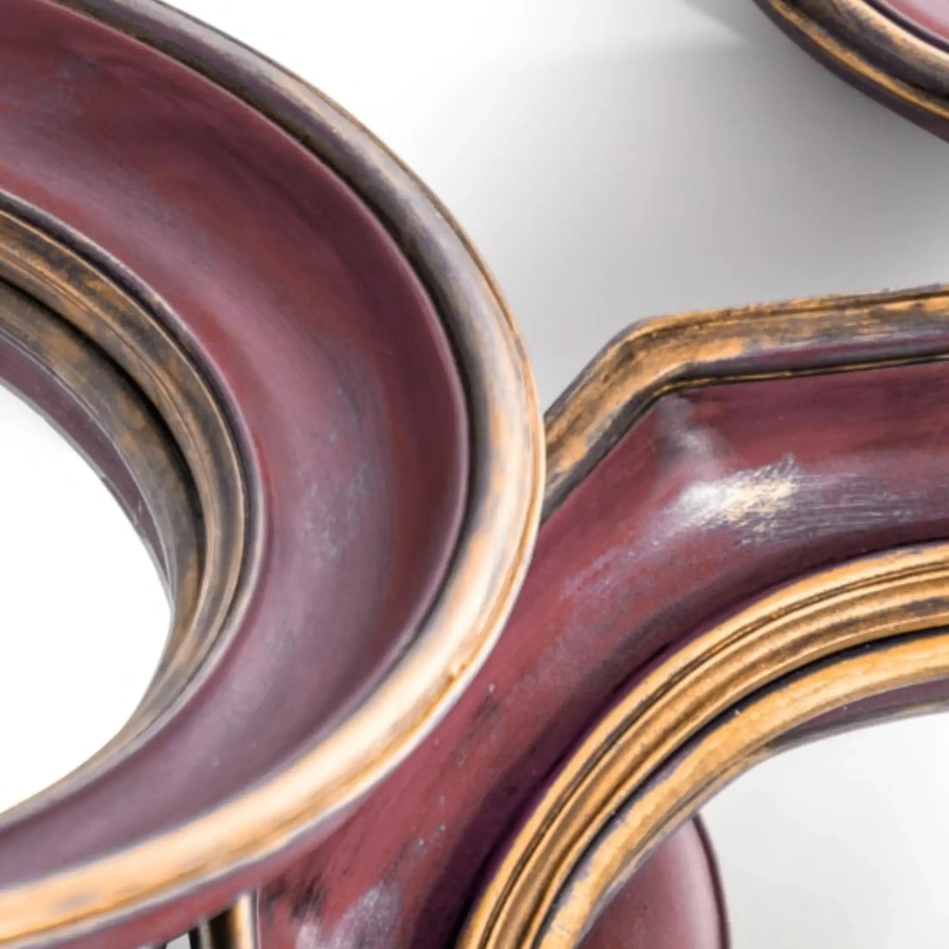 Close-up of a wooden object with a reflective surface