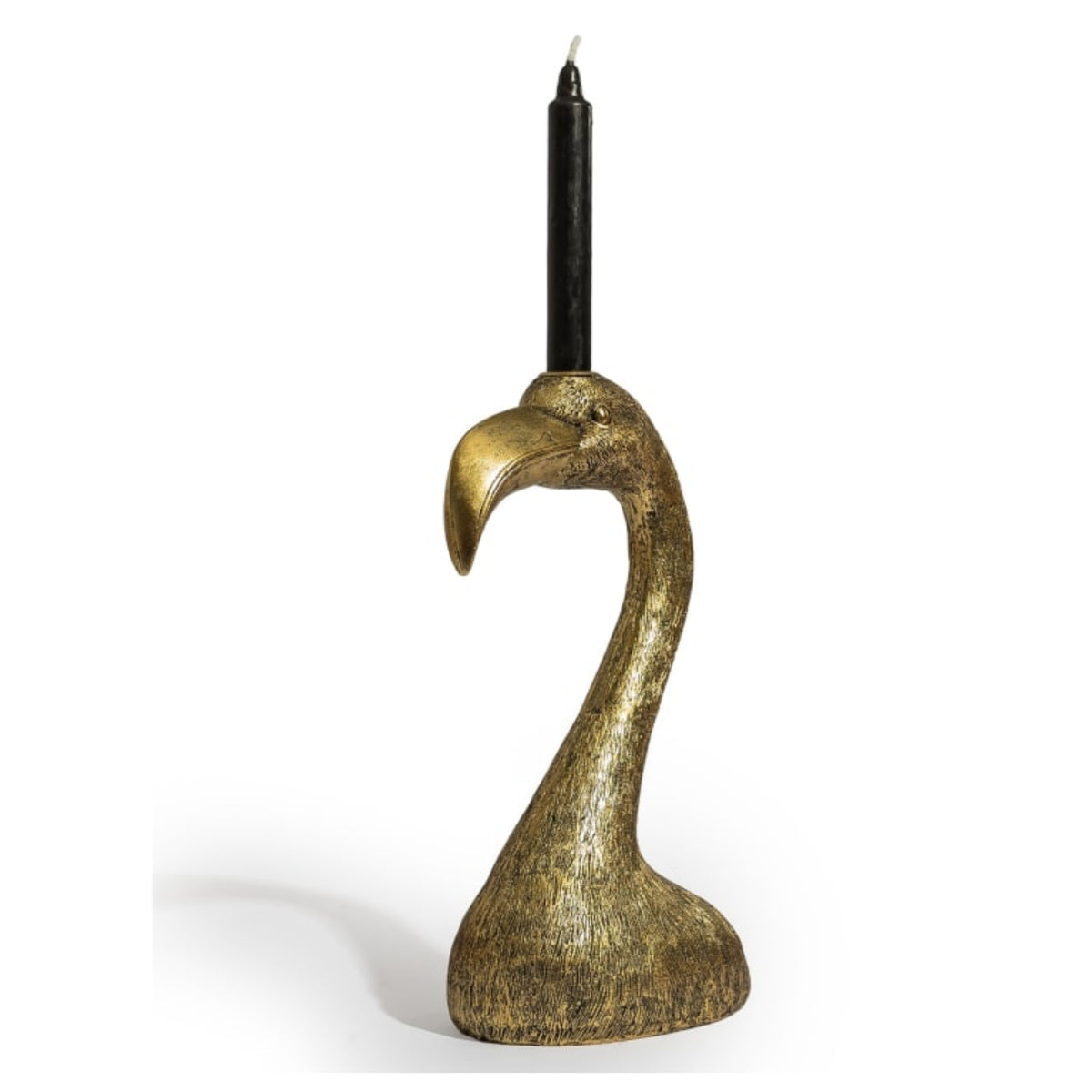 A sculptural candle holder shaped like a flamingo head in a textured metallic gold finish, holding a black taper candle, set against a plain white background.