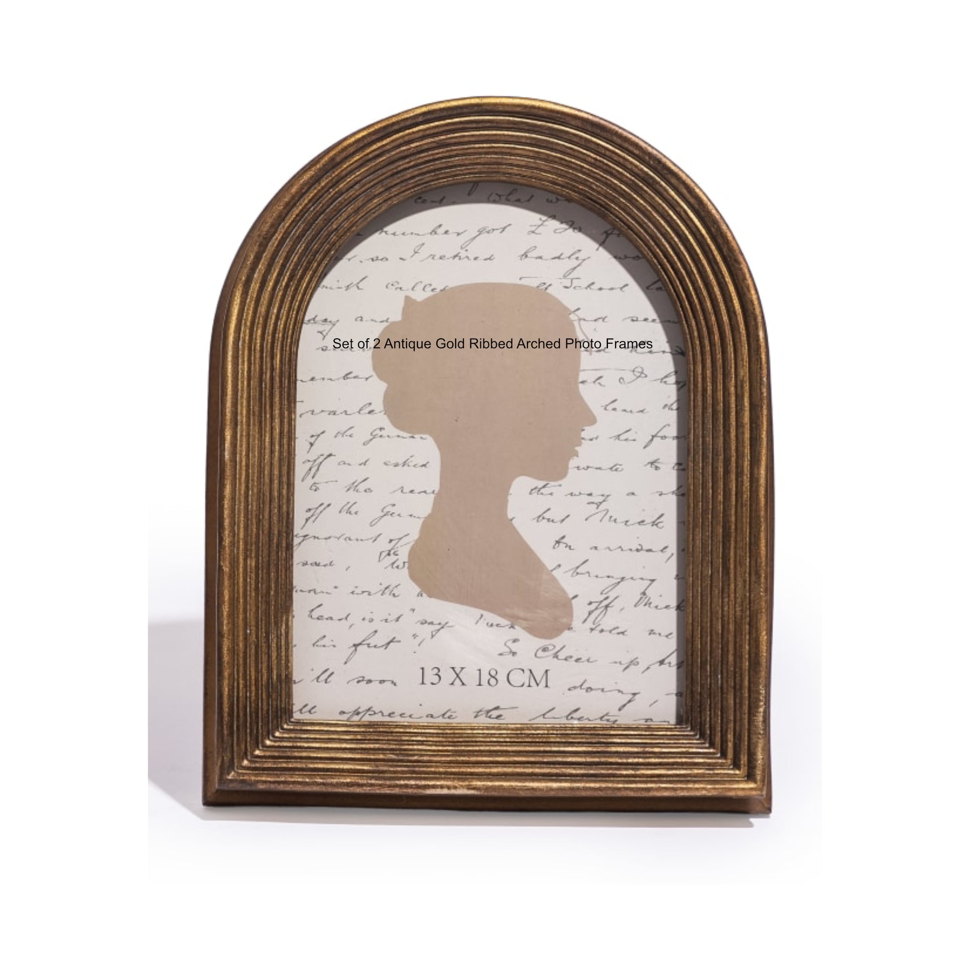 Antique gold ribbed arch photo frame with silhouette design on a white background