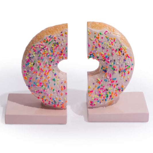 A pair of novelty donut-shaped bookends with colorful sprinkles on a white background.