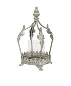 Decorative metal lantern with a clear glass candle holder on a white background