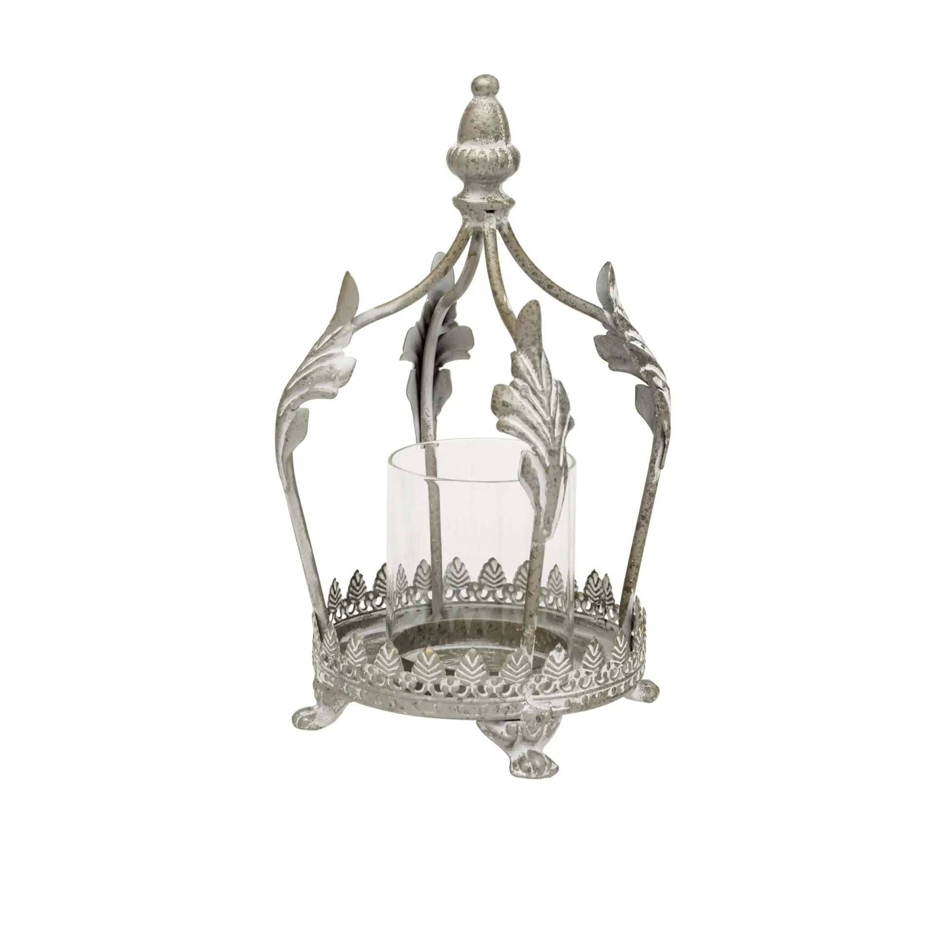 Decorative metal lantern with a clear glass candle holder on a white background