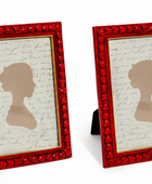 Two red-framed silhouettes on a white background