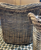 Wicker laundry basket on a patterned floor