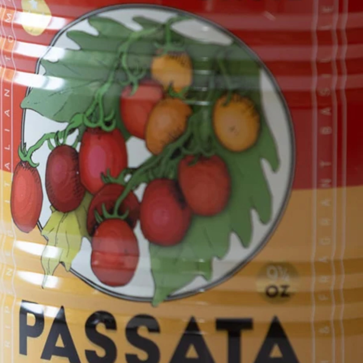 Close-up of a packaged food product label featuring an illustration of red and yellow cherry tomatoes on a vine with green leaves, above the word PASSATA.