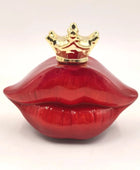 Red lip-shaped container with a gold crown on a white background