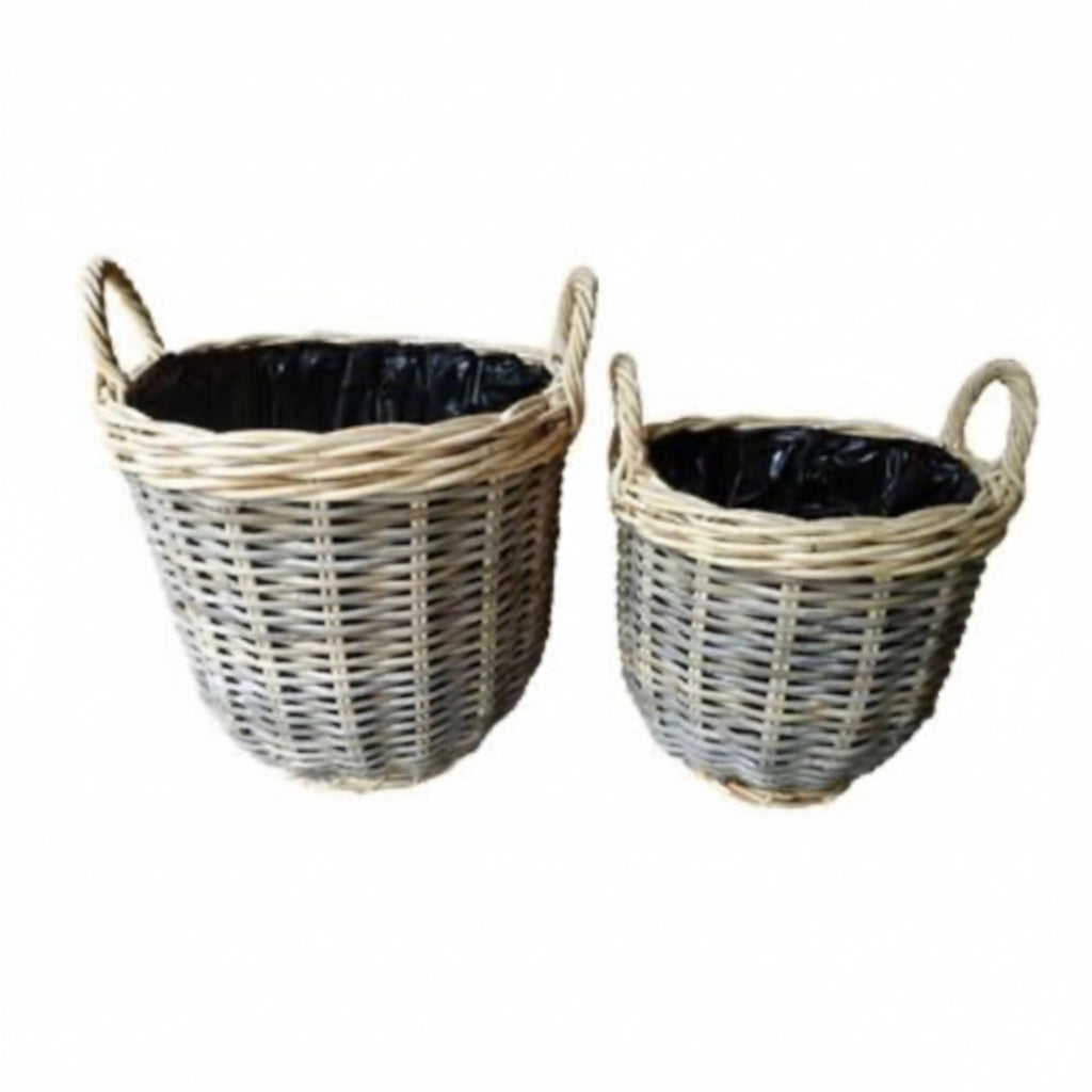 Two wicker baskets with handles on a white background