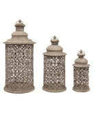 Set of three decorative lanterns with intricate patterns on a white background