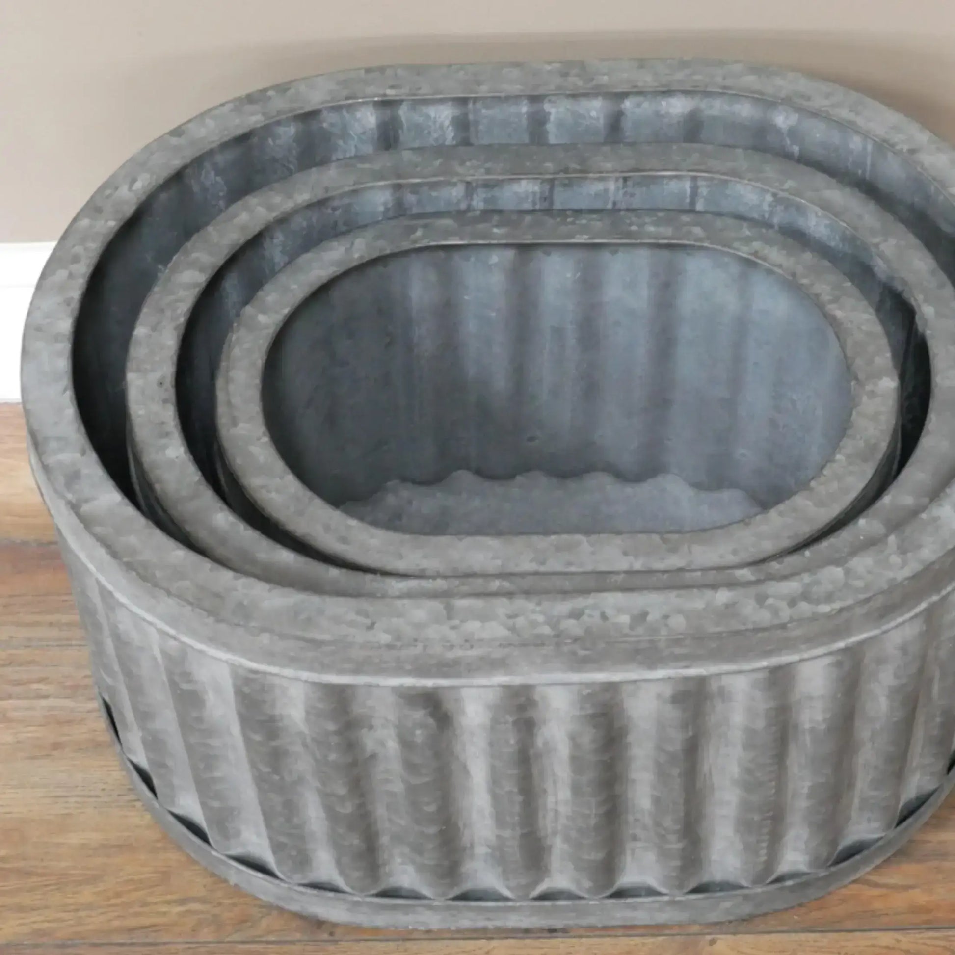 Set of 3 Oval Metal Ribbed Dolly Planters 44