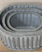 Set of 3 Oval Metal Ribbed Dolly Planters 44