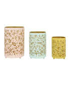 Three decorative vases with floral patterns on a white background
