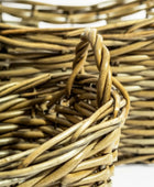 Close-up of a woven basket with a handle
