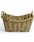 Wicker basket with handles on a white background