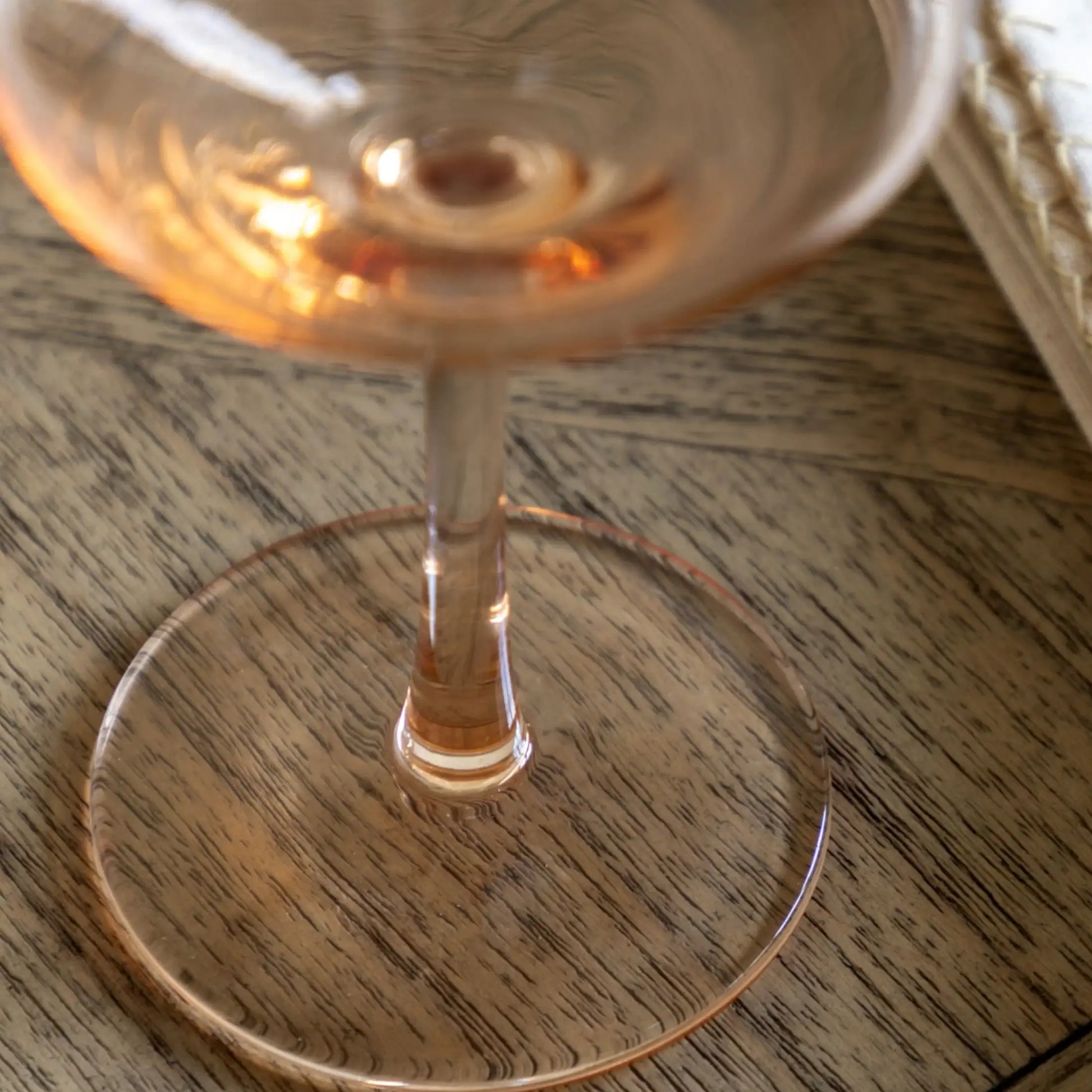 Close-up of a glass with a drink on a wooden surface