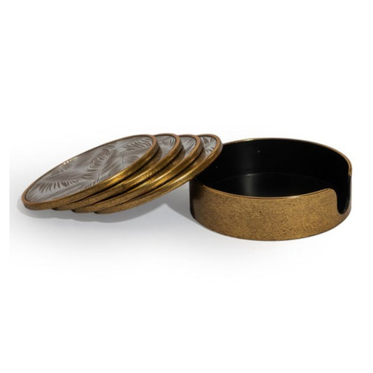 A set of four round coasters with a textured gold-toned outer rim and a silver-toned inner surface featuring a subtle sunburst pattern, shown with one coaster lifted to reveal the interior of the open round box.