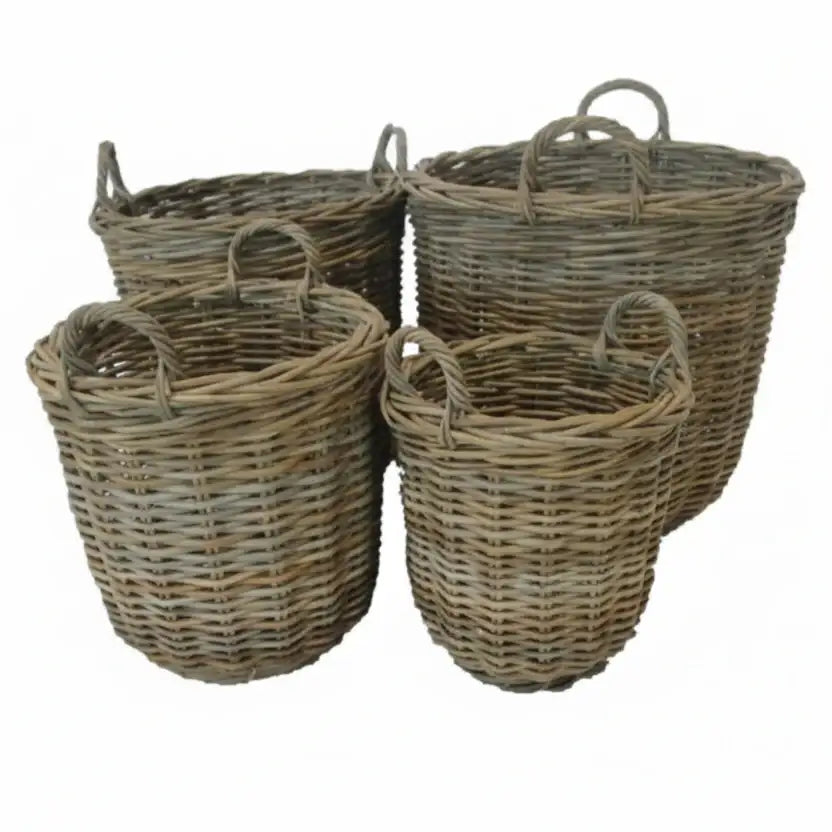 Set of four wicker baskets with handles on a white background