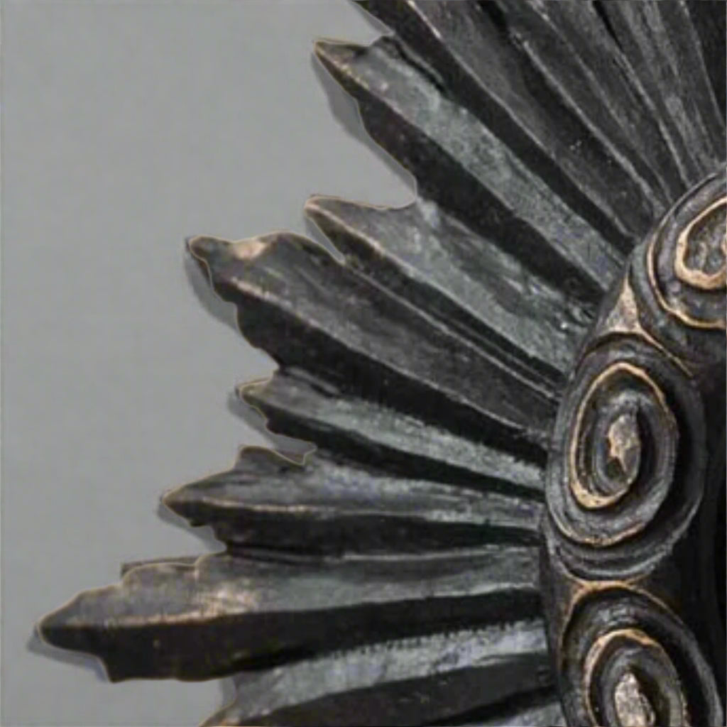 Close-up of a detailed metal gear on a beige background