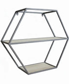 Geometric shelf with decorative items including a plant, bird figurine, and wooden blocks.