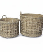 Two woven baskets with handles on a white background