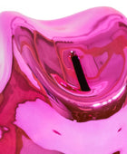 A close-up of a glossy, highly reflective pink ceramic or glass vessel with a black central stem or rod, set against a plain white background.