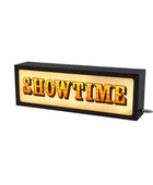 Neon sign with 'SHOWTIME' text on a white background