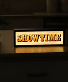 Wooden sign with 'SHOWTIME' on a dark background