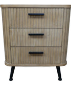 Wooden dresser with three drawers on a wooden floor against a gray wall.