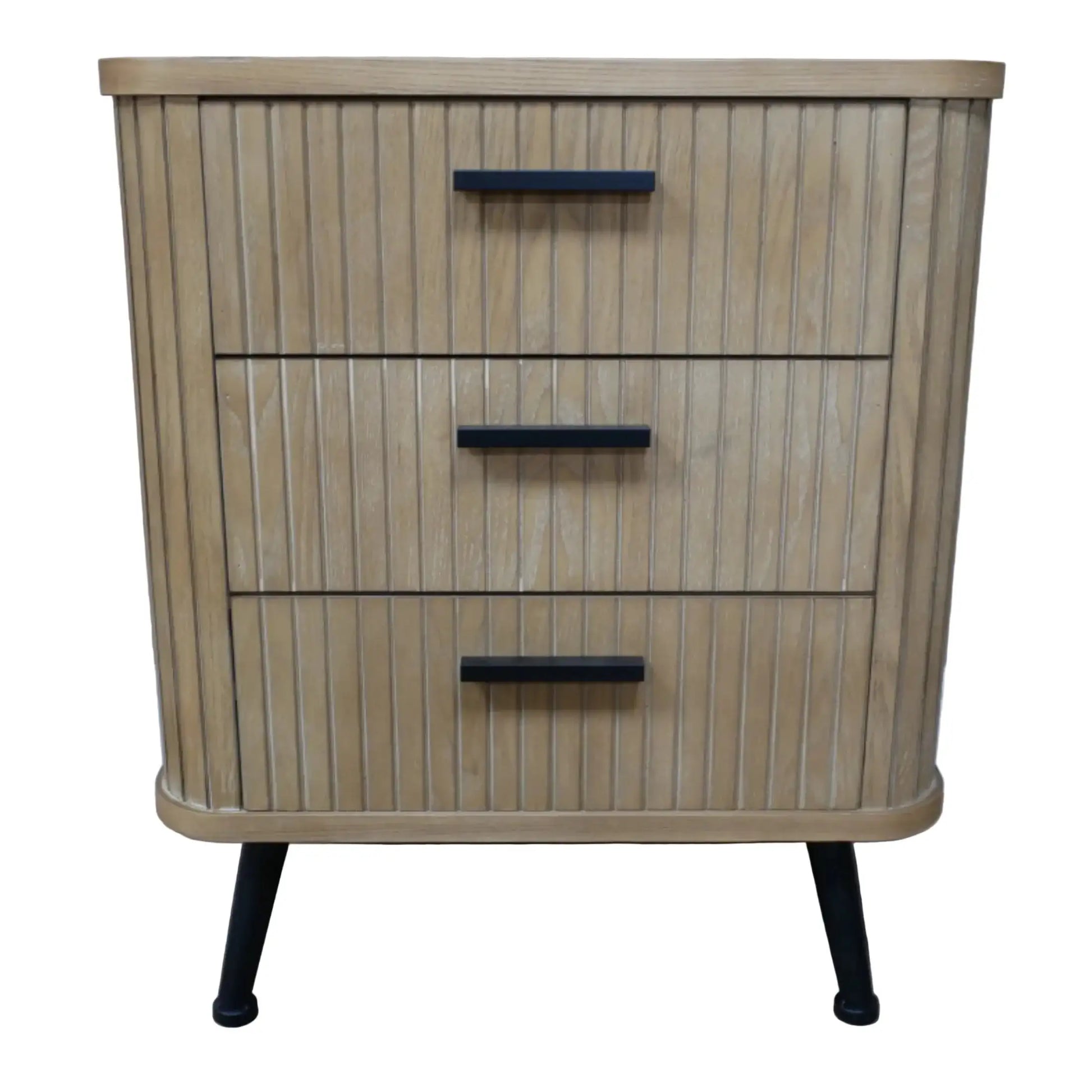 Wooden dresser with three drawers on a wooden floor against a gray wall.