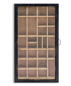 Decorative wall shelf with black frame and glass panels on a white background