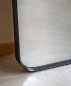 Slim Black Frame Curved Top Leaner Mirror