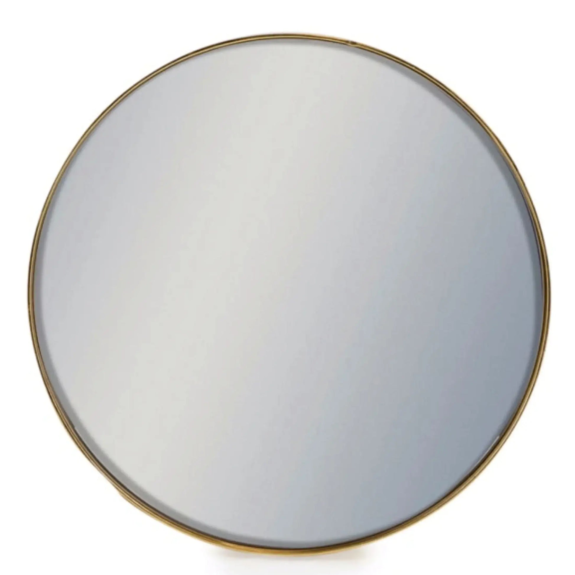 Round mirror with a gold frame on a white background