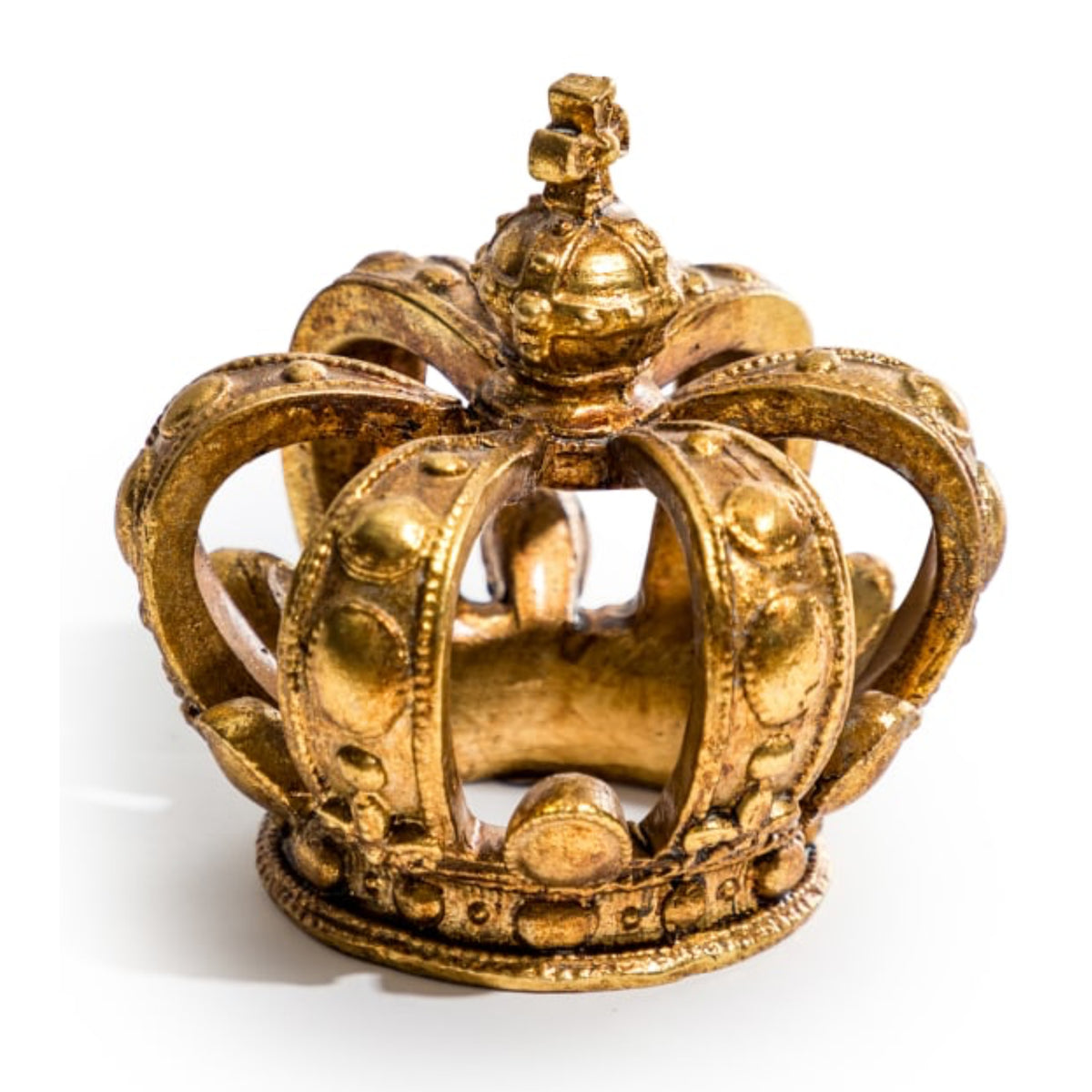 A miniature gold crown figurine with ornate details, photographed on a clean white background.