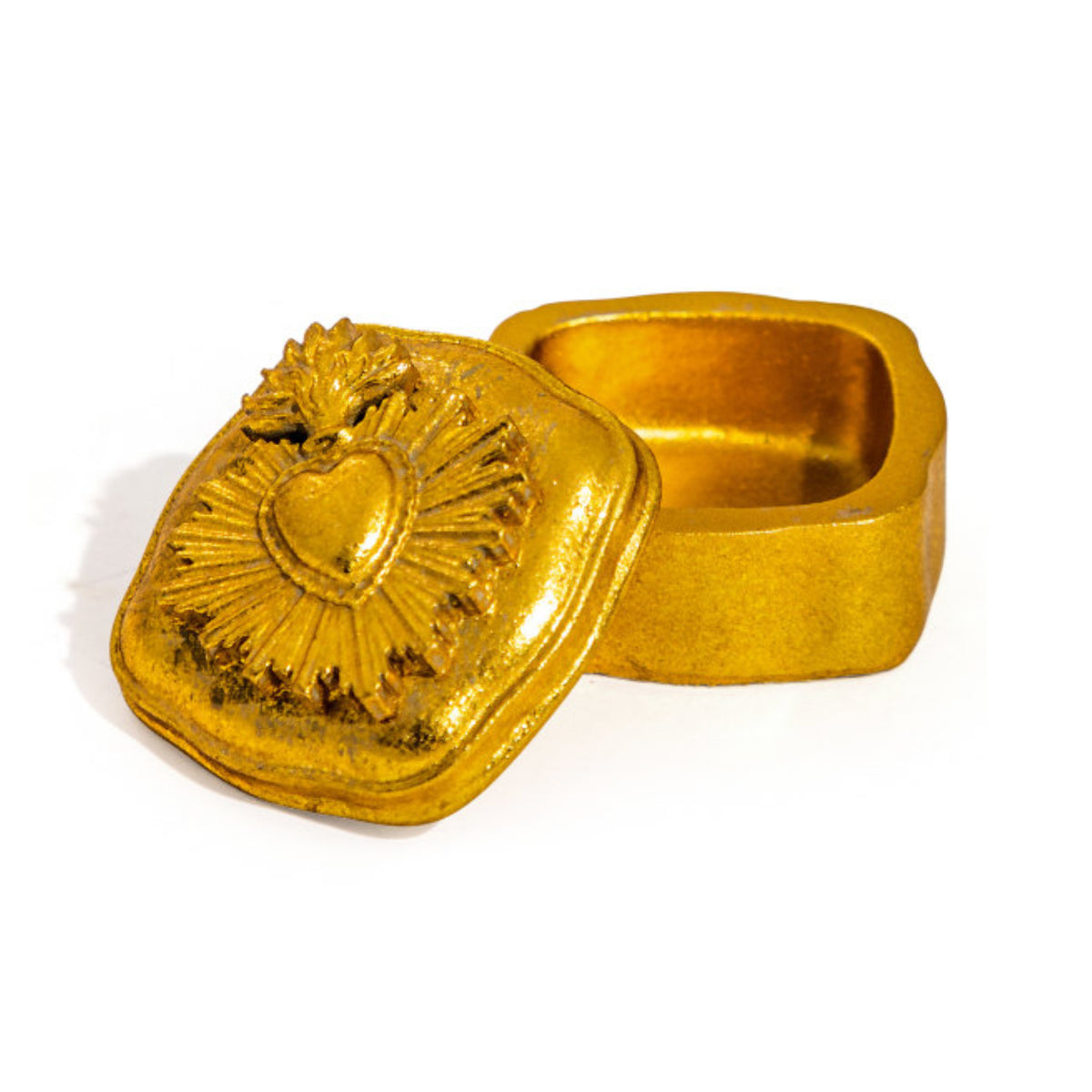 A small metallic gold keepsake box with a hinged lid featuring an embossed Sacred Heart design, shown open on a plain white background.