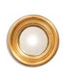 Round gold-framed mirror on a white background
