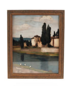 A framed landscape painting depicting a Tuscan scene with cypress trees, a river, and buildings under a cloudy sky, enclosed in a rustic brown wooden frame.