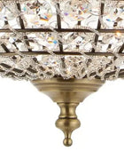 Close-up of a decorative chandelier with crystal accents on a white background