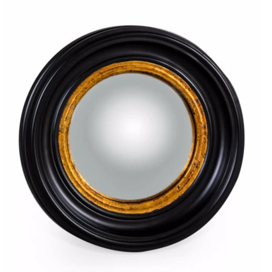 Round mirror with black and gold frame on a white background