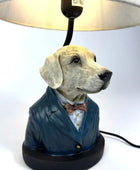 Dog-shaped lamp with a suit and bow tie on a white background