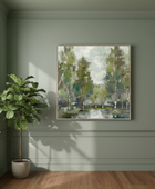 Room interior with a painting of trees on the wall, a potted plant, and a window.